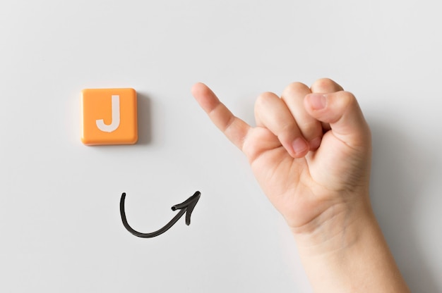 Free photo sign language hand showing letter j