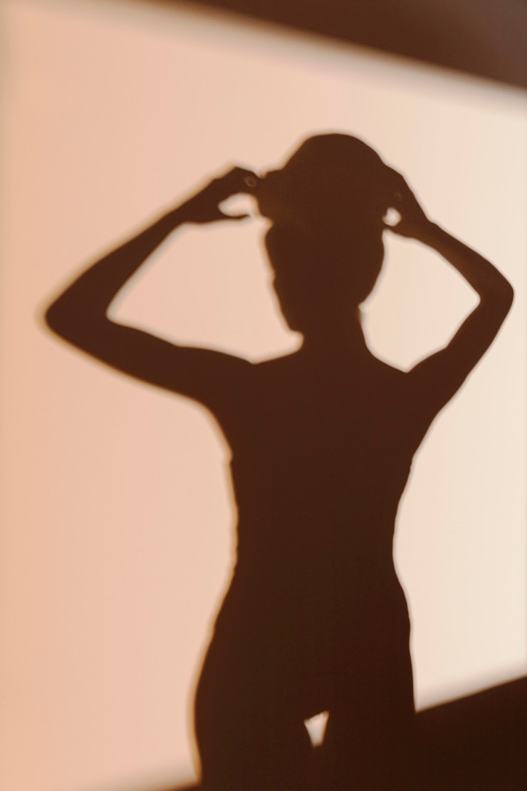 Free Photo silhouette of graceful woman after shower