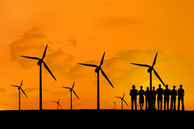 Free photo silhouette of people enjoying the renewable energy