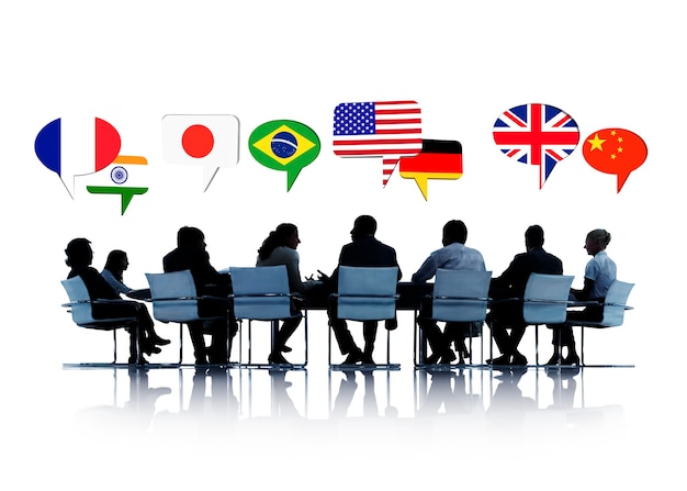 Silhouette of people in a meeting talking about different countries