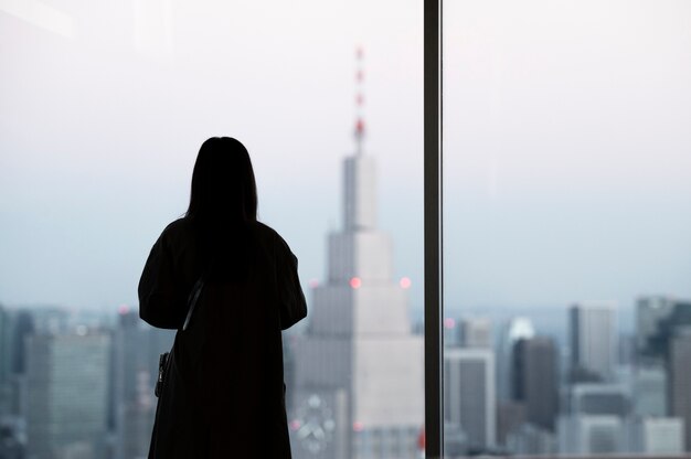 Silhouette of person in the city