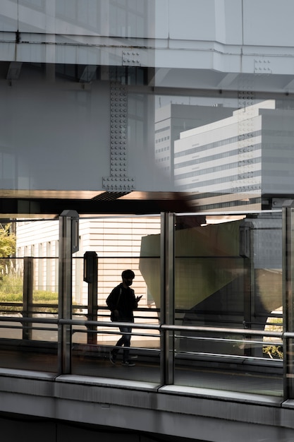 Free photo silhouette of person in the city