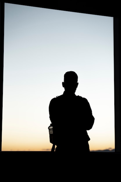 Free photo silhouette of person in the city