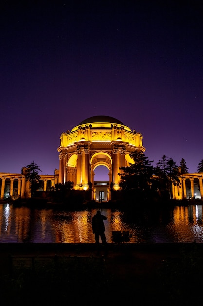 Silhouette of person in a momument during night