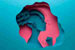 Free photo silhouette of a woman made with paper cut women39s day concept