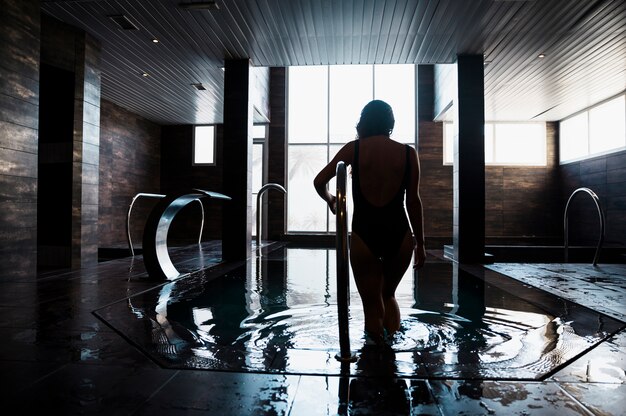 Silhouette of woman in spa