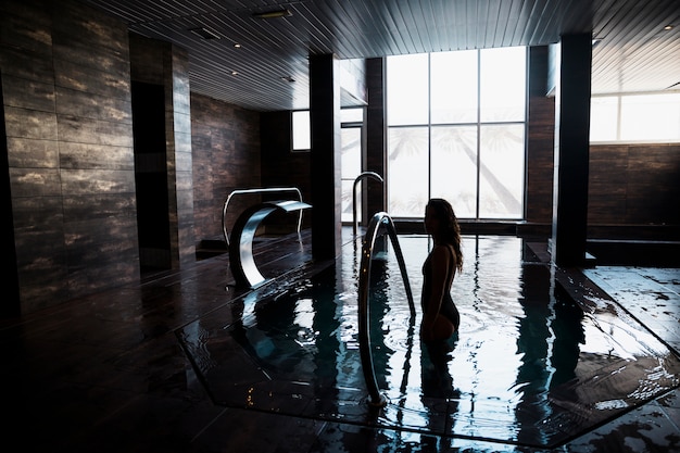 Silhouette of woman in spa