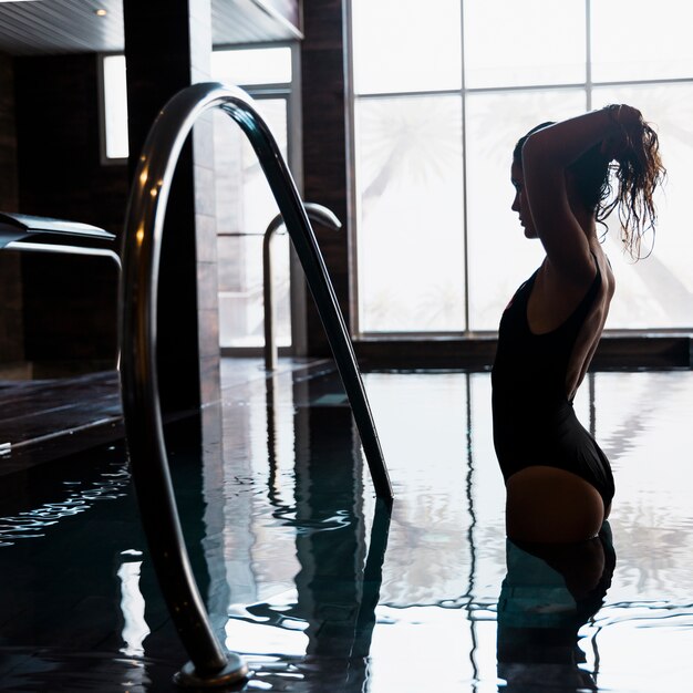 Silhouette of woman in spa