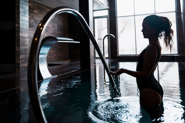 Silhouette of woman in spa