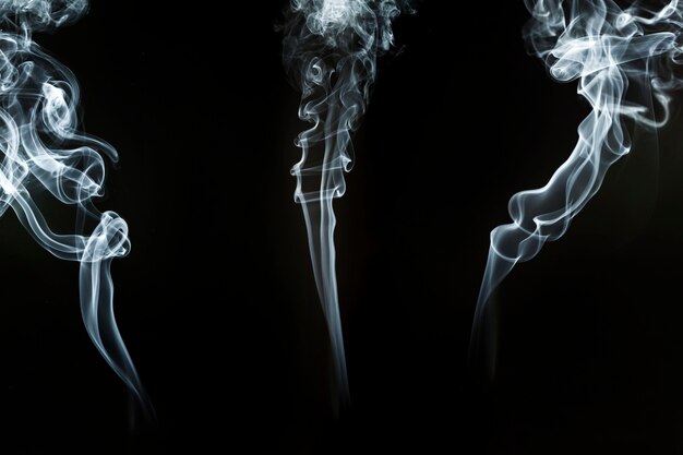 Silhouettes of smoke with spiral shapes