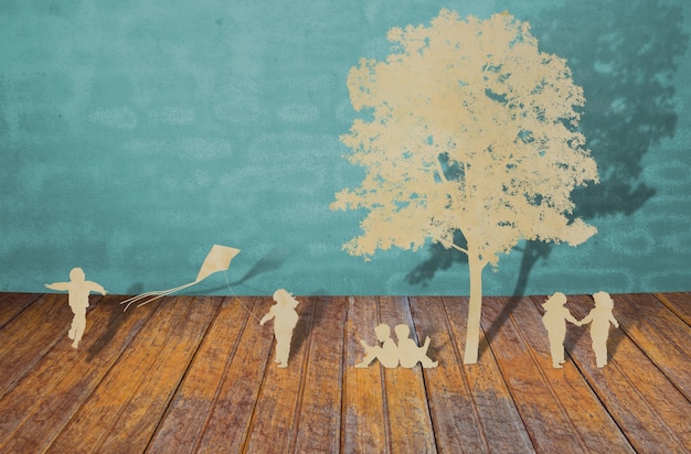 Silhouettes of trees and people on a wood