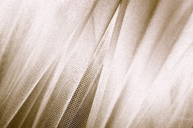 Silky gold fabric snakeskin textured