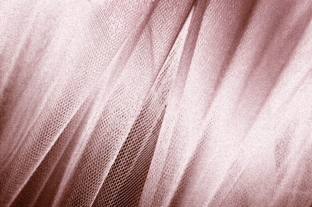 Silky pink gold fabric snakeskin textured