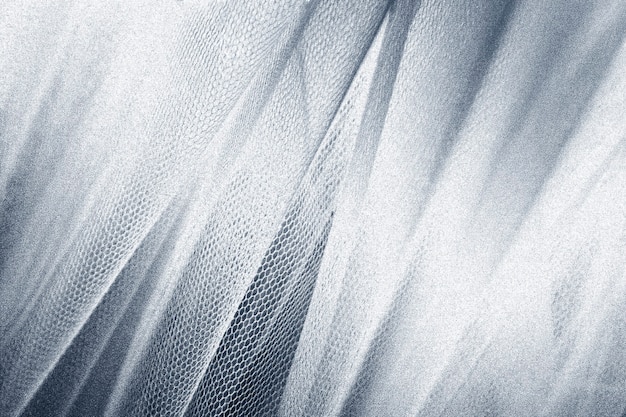 Silky silver fabric snakeskin textured background