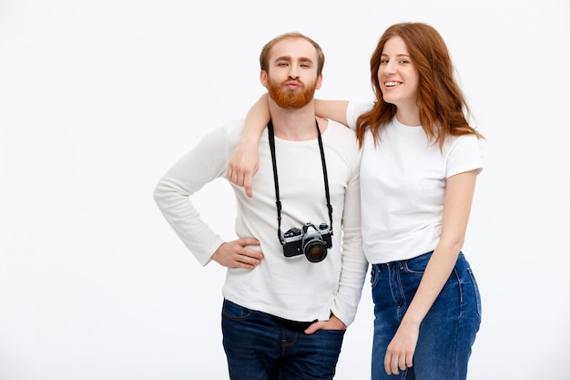 Silly couple taking photo together, smiling