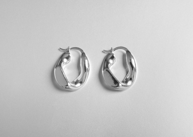 Silver aesthetic wallpaper with earrings