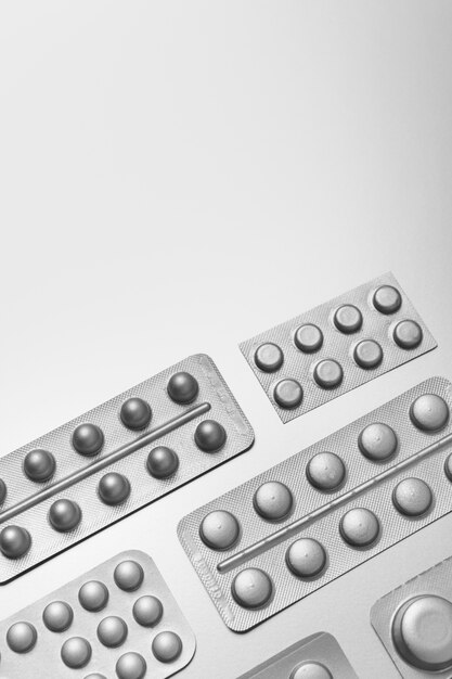Silver aesthetic wallpaper with pills flat lay