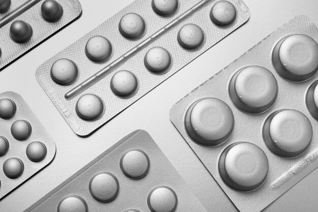 Silver aesthetic wallpaper with pills top view