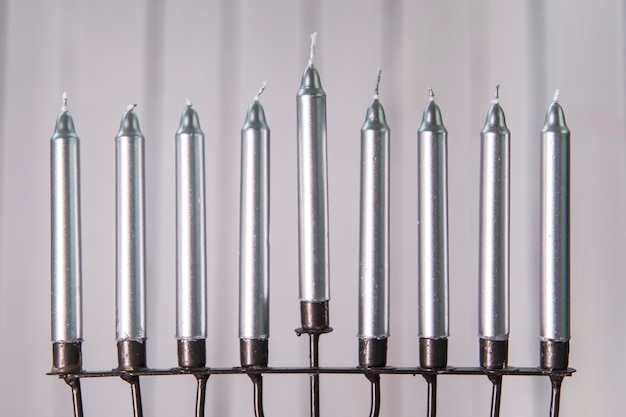 Silver candles of menorah