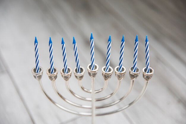 Silver menorah with candles