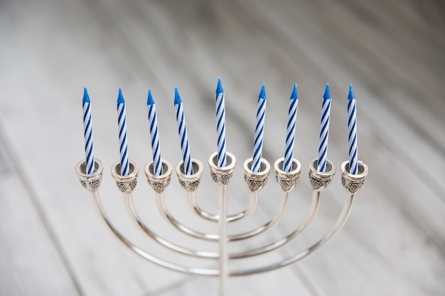 Silver menorah with candles