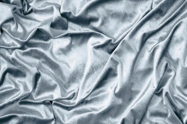 Silver shiny silk fabric texture