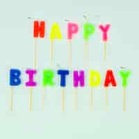 Free photo simple happy birthday message with colorful candles