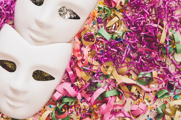 Simple white masks and glimmering confetti