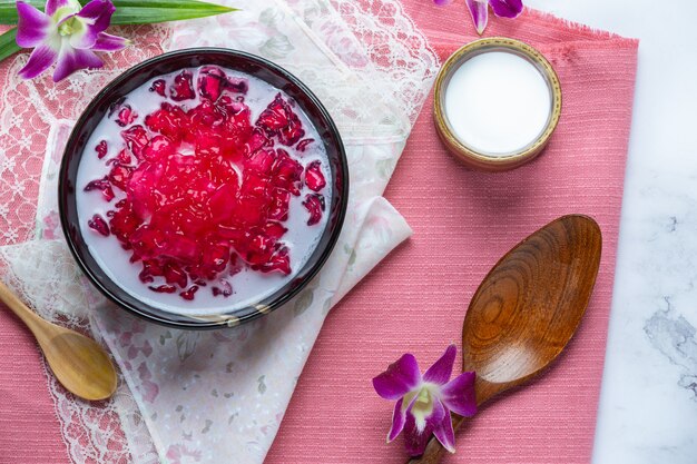 Simulated pomegranate in coconut syrup, cassava, Thai dessert.