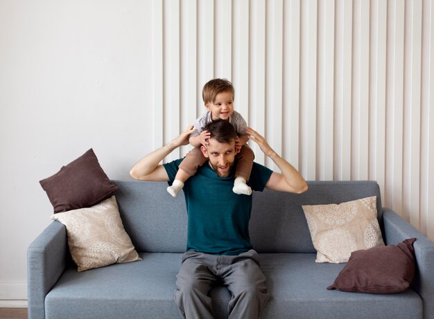 Single father spending time with his baby