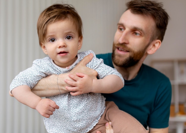 Single father spending time with his baby