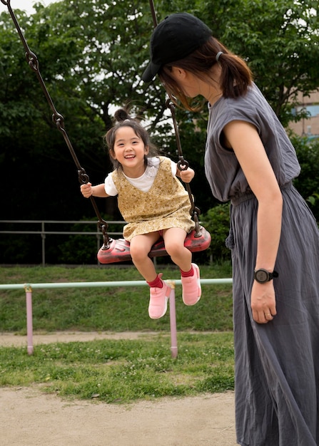 Single mom playing with her daughter