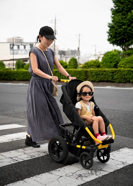 Single mom taking a walk with her daughter