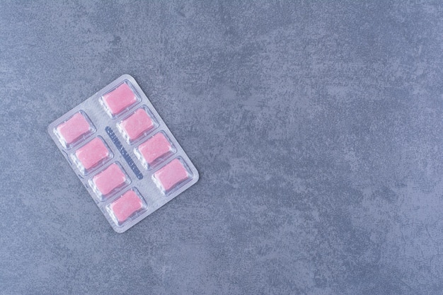 Single Pack Of Chewing Gum On A Colorful Surface