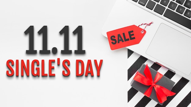 Single's day banner with gift and laptop