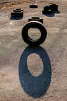 Free photo single vertical tire on asphalt