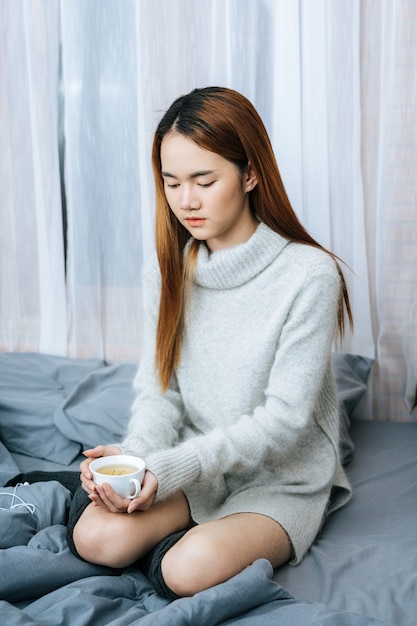 Free Photo sipping herbal tea on a cold day