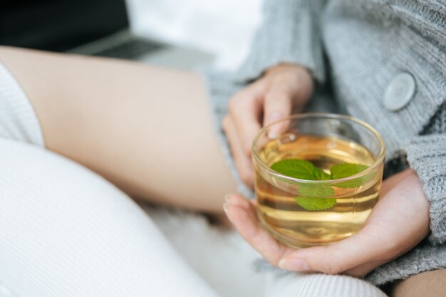 sipping herbal tea on a cold day