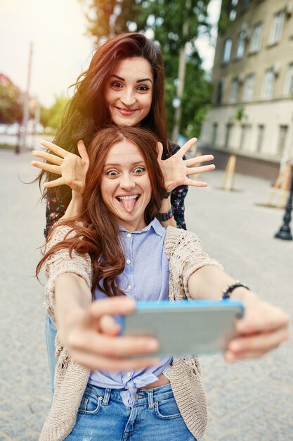 Sisters making selfie