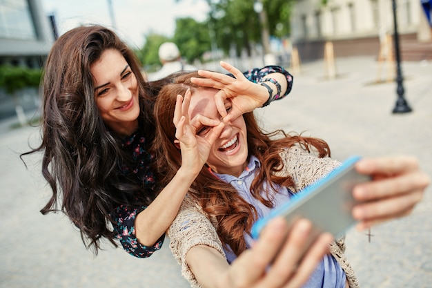 Sisters making selfie