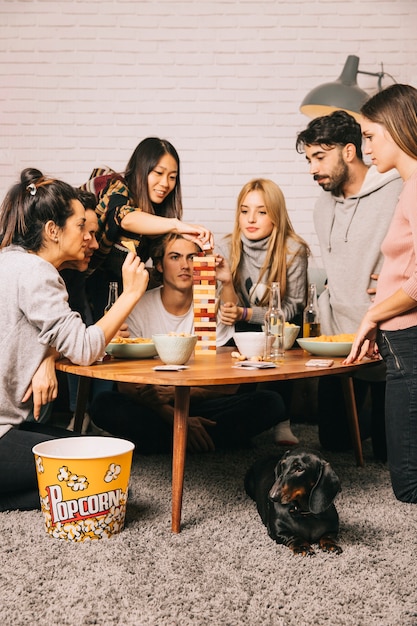 Six friends playing tabletop game