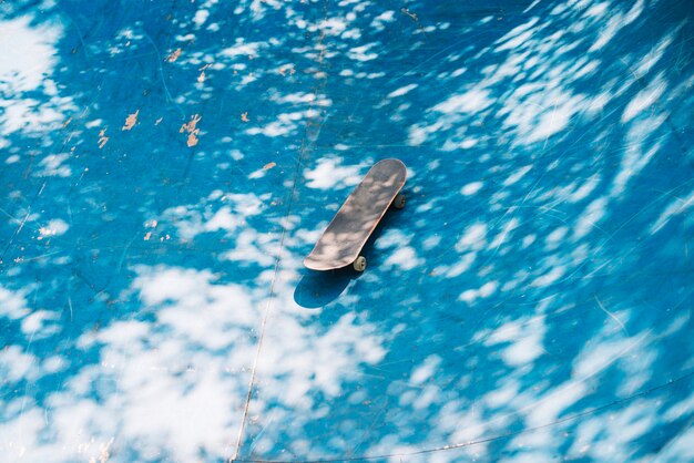 Skateboard on ramp in park