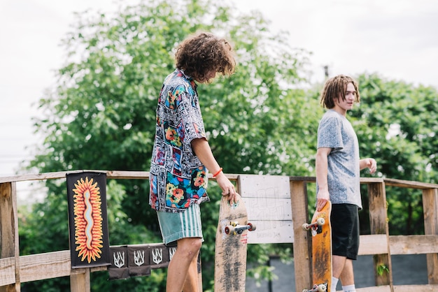 Free photo skateboarders preparing to ride