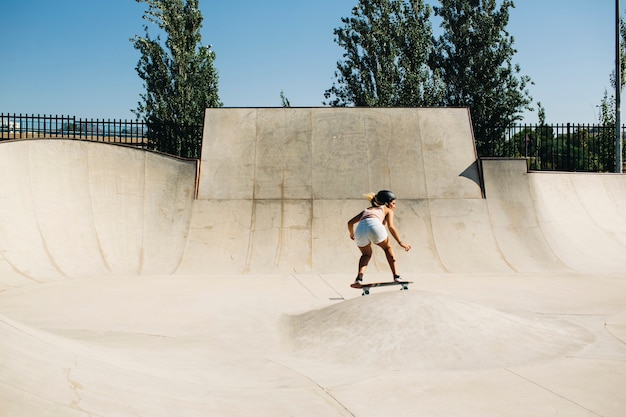 Skatepark and cool girl skateboarding