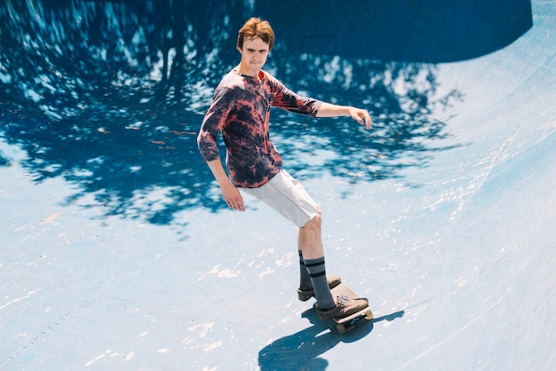 Skater riding in sunny day