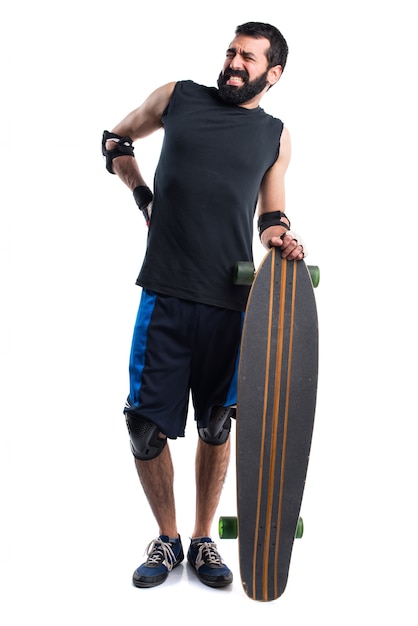 Free photo skater with back pain