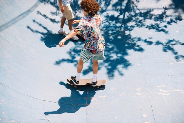 Skaters riding on ramp