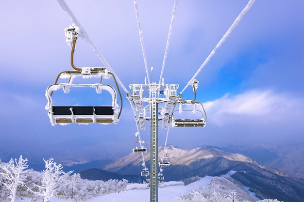 Ski chair lift is covered by snow in winter, Korea