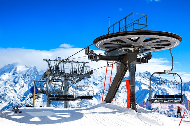 Free photo ski lift chairs on bright winter day