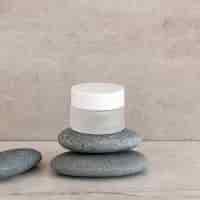 Free photo skin care moisture recipient arrangement with stones